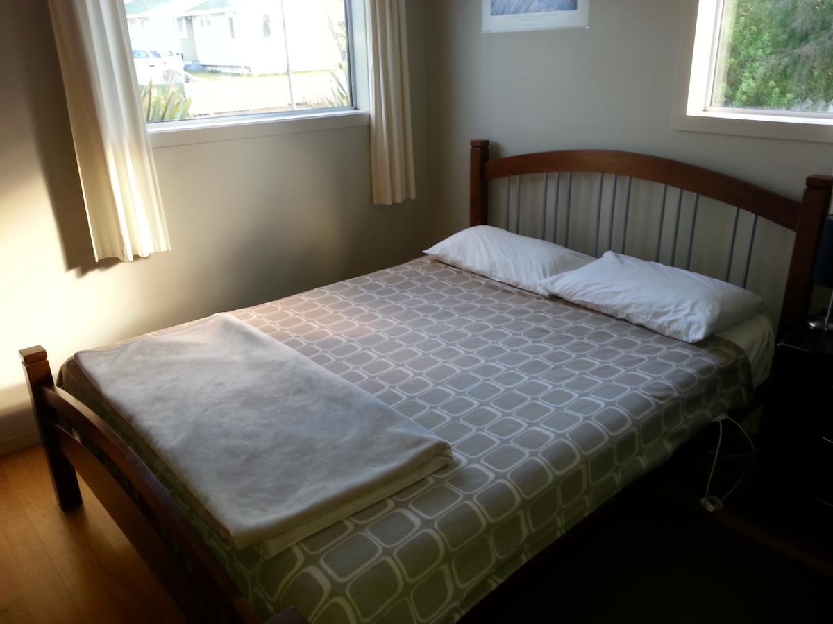 Riverstone Lodge Turangi Zewnętrze zdjęcie A bed